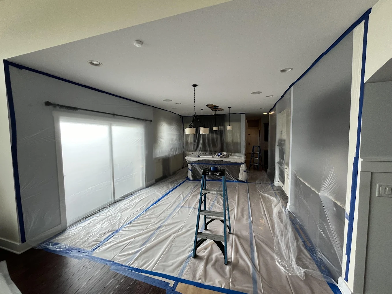 Mr. Restoration team cleaning up water damage
